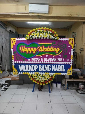 Papan Bunga di Matraman